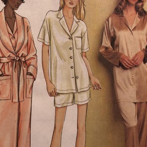 May include: Illustration of three figures in sleepwear. The figure on the left is wearing a peach-coloured robe with a tie. The middle figure is wearing a cream-coloured pajama set with a short-sleeved button-down shirt and shorts. The figure on the right is wearing a tan pajama set.