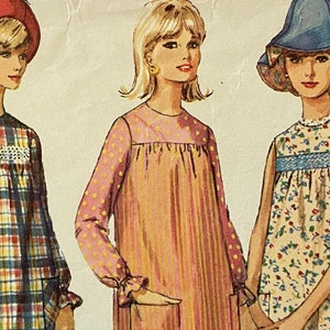 May include: Three vintage sewing patterns for dresses. The patterns feature illustrations of women wearing the dresses. The dresses are all different styles, one is plaid, one is striped, and one is floral.