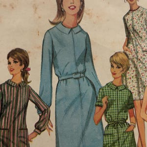 May include: Vintage fashion illustration featuring women in dresses. The dresses include a light blue long-sleeve dress with a belt, a green plaid dress, a floral print dress, and a striped dress. The illustration has a retro aesthetic.