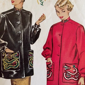 May include: Two women's smock jackets with a mandarin collar and a dragon design on the pockets. The jacket on the left is black and the jacket on the right is red. The text "Misses' Smock" is visible in the top right corner of the image.