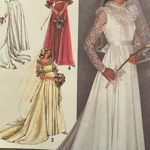 May include: A vintage sewing pattern featuring three different wedding dress designs. The dresses are all white and have long sleeves. The first dress has a simple, elegant design with a high neckline and a fitted bodice. The second dress has a more romantic look with a lace bodice and a flowing skirt. The third dress has a more modern look with a fitted bodice and a flowing skirt.