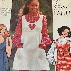 May include: A vintage sewing pattern for a sleeveless dress with a heart-shaped detail. The pattern includes instructions on how to apply a slot zipper. The pattern is for sizes 10-18.