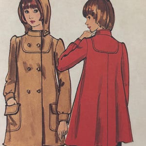 May include: Illustration of two coats. One is a tan double-breasted coat with a hood and large pockets. The other is a red coat with a rounded collar. Both coats have long sleeves. The person on the left is wearing plaid pants.