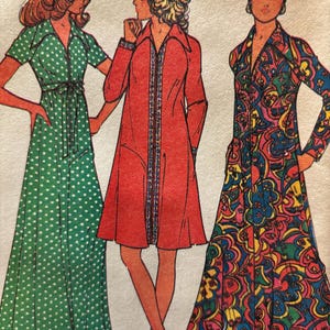 May include: Illustration of three vintage dresses. The first is a green dress with white polka dots. The second is a red dress with a decorative trim. The third is a long dress with a colorful paisley pattern.