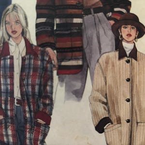May include: A fashion illustration featuring two coat designs labeled B. One coat is a red, white, and blue plaid pattern with a dark collar. The second coat is a solid tan color with a dark collar, buttons, and a matching dark brown hat.