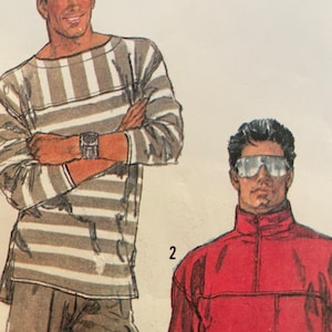 May include: Two men's shirts, one striped and one solid red. The striped shirt has a boat neck and long sleeves. The red shirt has a mock neck and long sleeves. The number "2" is written on the image.