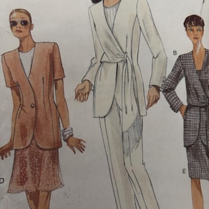 May include: A set of three ceramic mugs with a speckled, matte finish in cream, light grey, and dark grey. Each mug has a simple, minimalist design, suitable for coffee or tea.