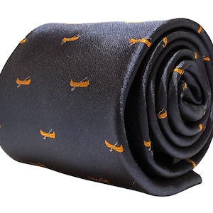 May include: A dark blue silk tie with a repeating pattern of orange canoes. The tie is rolled up.