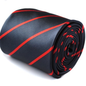 May include: A rolled up dark blue and red striped tie. The tie has a diagonal stripe pattern.