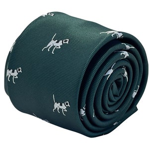 May include: A dark green silk tie with a white repeating pattern of a dog running. The tie is rolled up and ready to be worn.