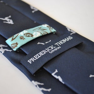Navy Blue Tie With Rugby Player Embroidered Design by Frederick Thomas ...