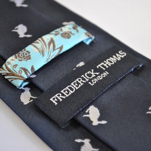 Navy Blue Tie With Rabbit Design With Signature Floral Design to the ...
