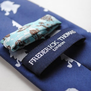 navy tie with sherlock holmes design and signature floral design to rear by Frederick Thomas FT624 image 4