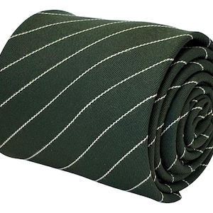 May include: Rolled dark green tie with white stripes. The tie is made of a smooth fabric and is rolled up, showcasing the pattern and texture. The stripes are evenly spaced and run diagonally across the tie.