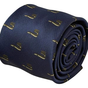 May include: A rolled necktie in a deep navy blue color featuring a repeating pattern of small, light-colored smoking pipes. The fabric has a visible diagonal twill weave texture throughout the entire surface of the necktie.