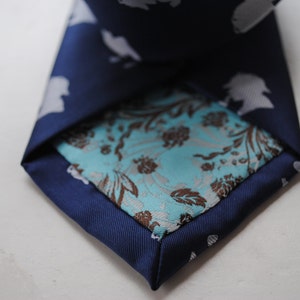 navy tie with sherlock holmes design and signature floral design to rear by Frederick Thomas FT624 image 2