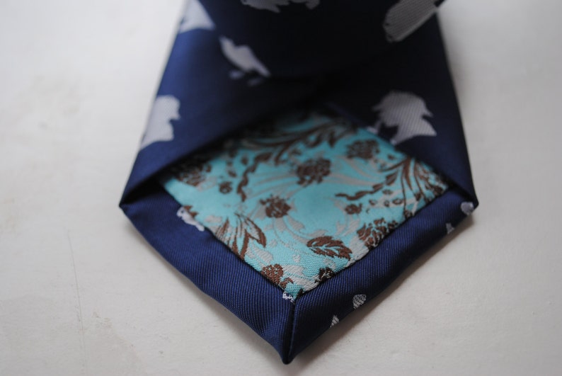 navy tie with sherlock holmes design and signature floral design to rear by Frederick Thomas FT624 image 2