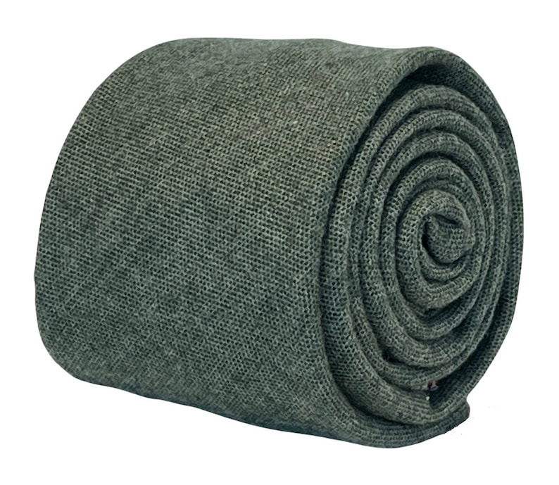 May include: A dark green rolled necktie made of a textured fabric.