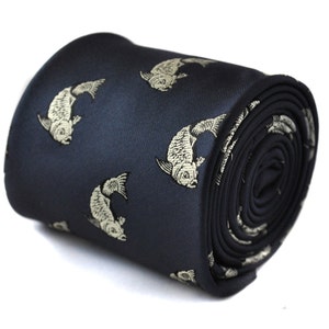 May include: A dark blue silk tie with a white fish pattern.