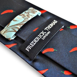 navy blue tie with chilli design with signature floral design to the rear by Frederick Thomas FT3243 image 3