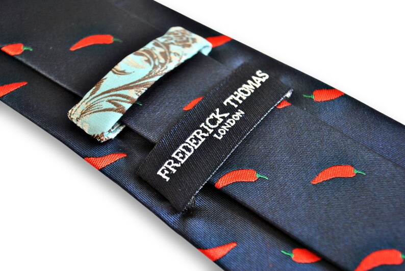 navy blue tie with chilli design with signature floral design to the rear by Frederick Thomas FT3243 image 3