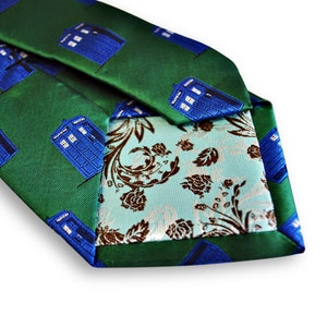 green tie with blue policeman tardis box embroidered design with signature floral design to the rear by Frederick Thomas FT3227 image 4