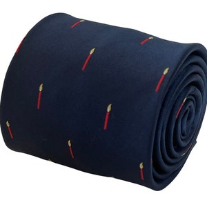 May include: Rolled navy blue tie with a repeating pattern of red paintbrushes with yellow bristles. The tie is made of a smooth fabric and is suitable for formal or business attire.