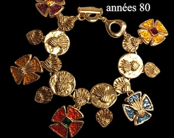 Yves Saint Laurent - jewelry/bracelet with charms, enamels, malt cross, gold metal, vintage 80s