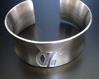 YVES SAINT LAURENT bracelet/jonc/manchette argent massif 925