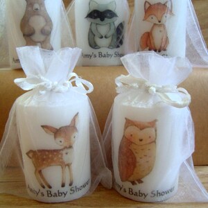 Close up of woodland animals in white organza bags.  Bags are included in purchase.
