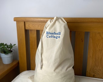 Personalised Laundry Sack Bag perfect for commercial holiday rentals Airbnb. embroidered with a choice of colours in your property name.