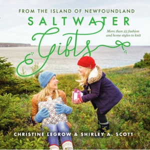 May include: The cover of a book titled "Saltwater Gifts" features two people exchanging gifts outdoors. The book's title is in green script, with the text "From the Island of Newfoundland" above it. The cover also includes the authors' names and the tagline "More than 25 fashion and home styles to knit."