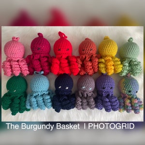 May include: A collection of 12 crocheted octopus plushies in various colors, including pink, red, orange, yellow, green, blue, purple, and teal. The octopus plushies have black eyes and are arranged in a row on a white surface.