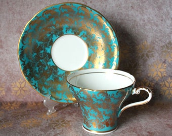 Aynsley Bone China theekopje en schoteltje patroon C869 groenblauw gouden korset vorm kop