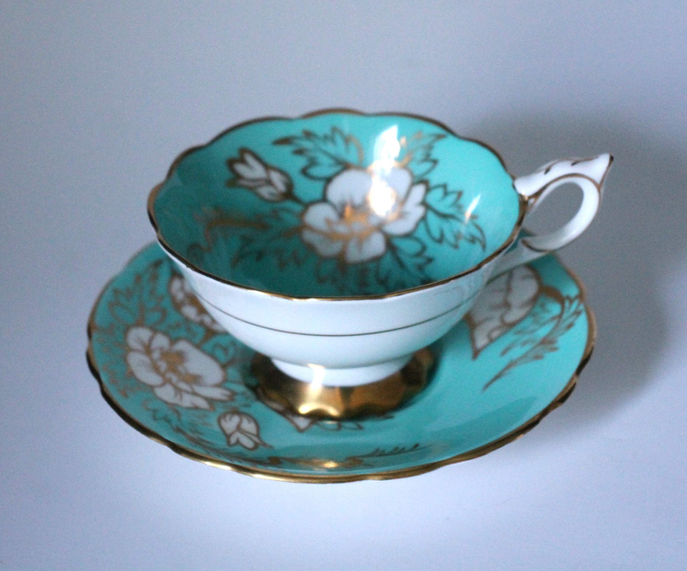 Teacup and Saucer Turquoise Poppy Pattern 8504 Royal