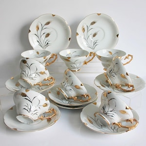 Tea Cups and Saucers Eight Sets Gold and Silver Oakwood  Vintage 1950's