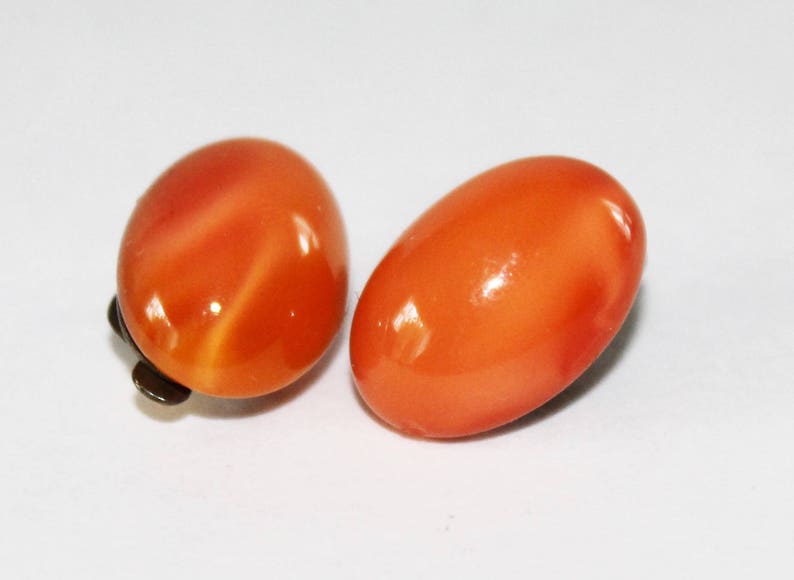 Vintage Orange Glass Earrings Clip Ons 1930s Glow Oval Cats Eye Pattern