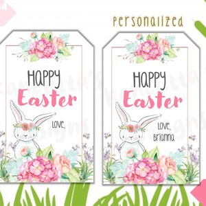 May include: Two Easter-themed gift tags. Each tag features a white bunny with a floral crown and a watercolor floral arrangement. The text "HAPPY EASTER" is displayed in black and pink. One tag is personalized.