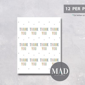 May include: A sheet of printable thank you cards with a repeating pattern. Each card features the words "THANK YOU" in pastel colours. The sheet is labelled "12 PER PAGE" and "Us letter or A4". A logo for "MAD PRINTABLES" is in the bottom right corner.