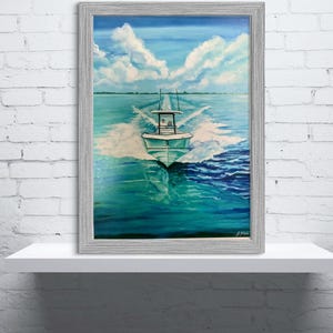 May include: A framed painting of a boat speeding across turquoise water, creating white foamy wakes. The sky is a light blue with fluffy white clouds. The painting is in a gray wooden frame.