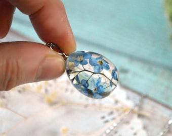 dry forget me not pendant necklaces egg, real blue flowers resin jewelry Easter gift for women sympathy gift for her floral best friend gift