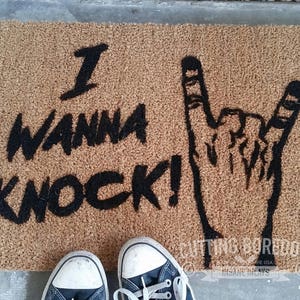 I Wanna Knock! A doormat for those who rock.