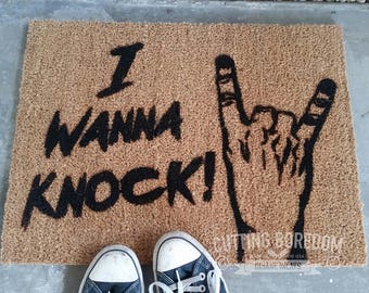 I Wanna Knock! A doormat for those who rock.