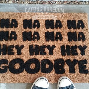 NaNaNaNa Goodbye Funny doormat! An entry rug that will put a song in your head on your way out the door.