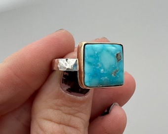 14kt Gold-filled bezel, Sterling Silver Hammered Band, White Water Turquoise. Size 7.5.