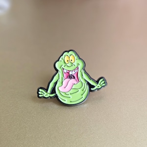Slimer Enamel Pin. Ghostbusters Movie. 80&#39;s Movies. 80&#39;s Cartoons. Cartoon Pin. Movie Pin.