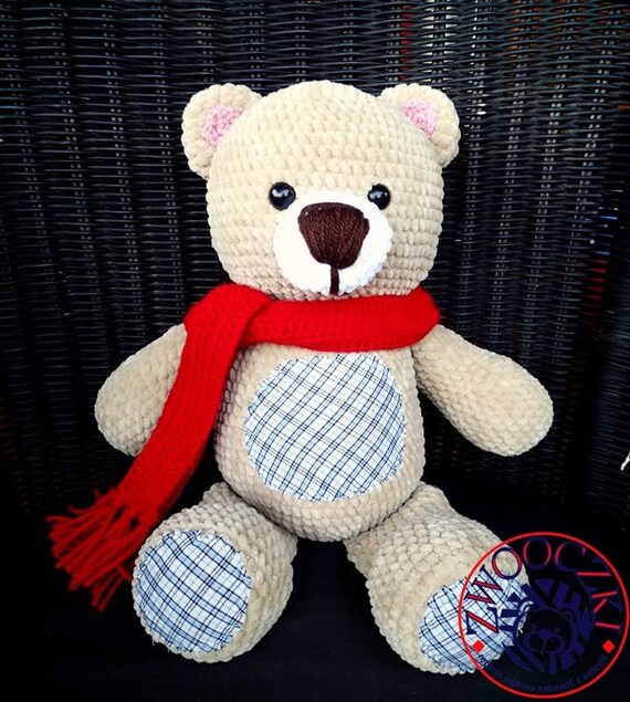 teddy bear with red scarf