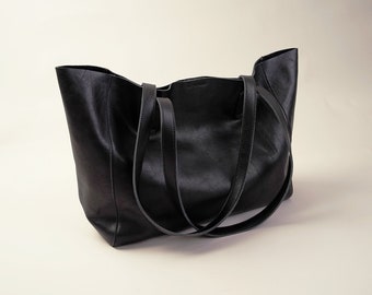 large black leather bag