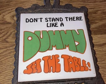 1970s KK Tile/ Cast Iron Trivet: Don't Stand there like a dummy, Set the Table