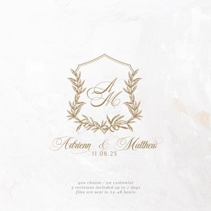 May include: A wedding monogram design with a gold shield and olive branch wreath. The initials "A & M" are inside the shield. The text "Adrienn & Matthew 11.08.25" is below the shield. The text "you choose/ we customize 3 revisions included up to 7 days files are sent in 24-48 hours" is below the names.